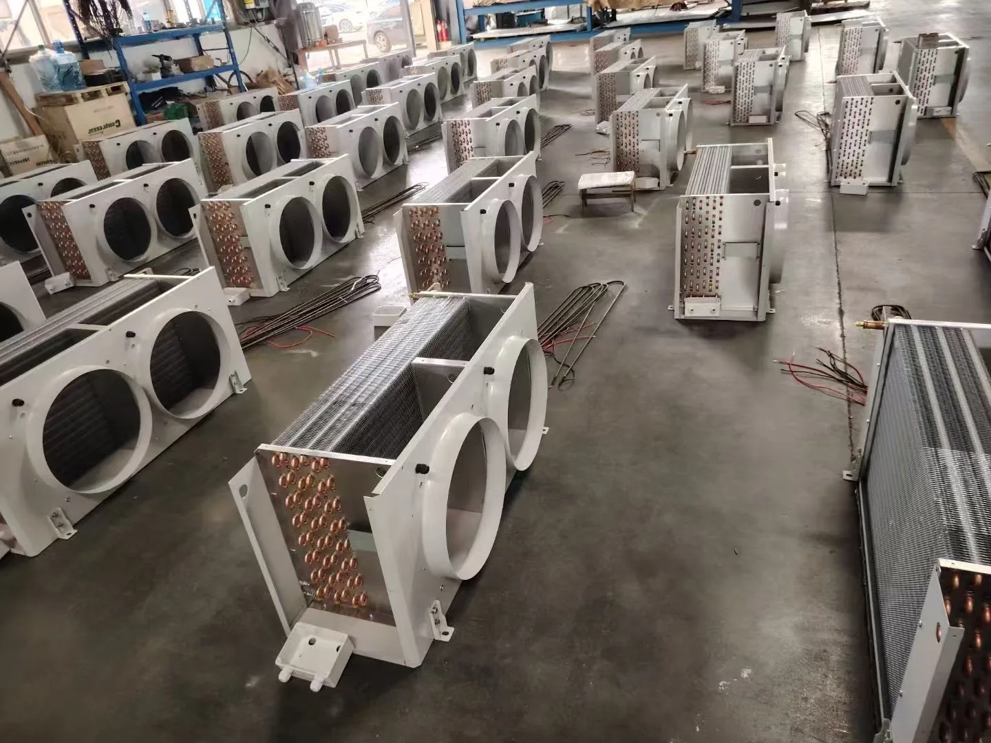 Air coolers arranged on a factory floor