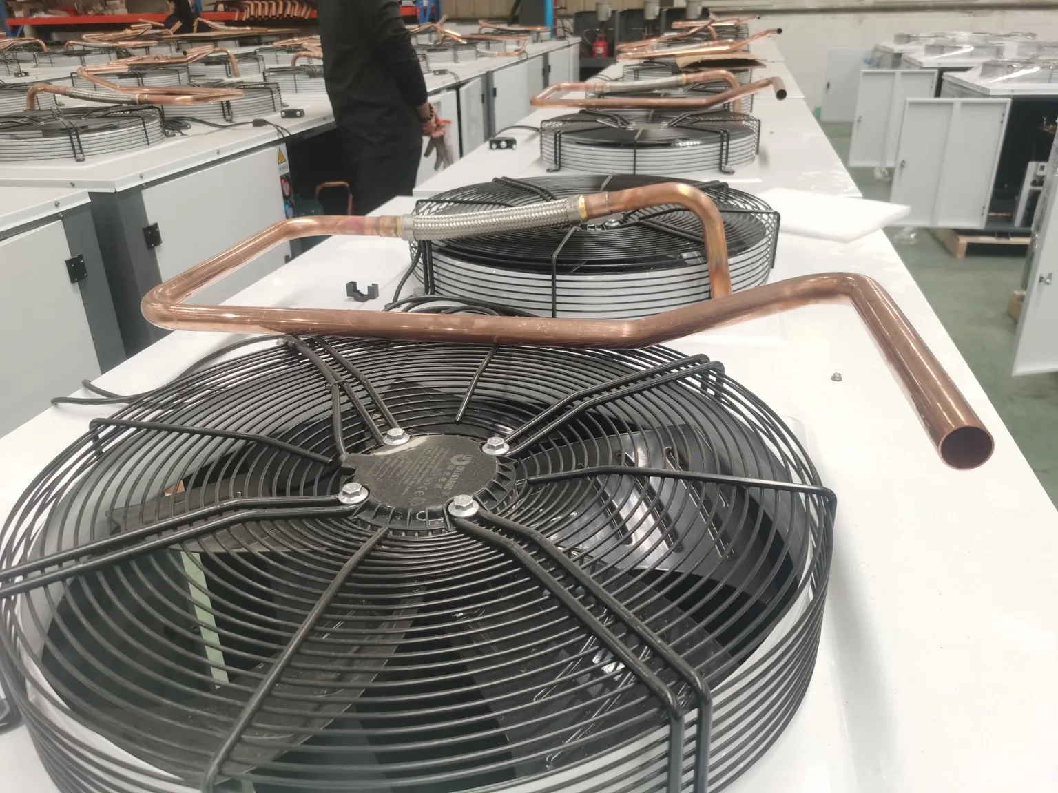 Close view of air cooler fans and copper pipework